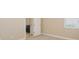 Bedroom features carpet, baseboards and neutral walls with an ensuite bathroom at 15698 Marina Bay Dr, Winter Garden, FL 34787