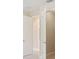 Hallway with doors leading to a closet and other rooms at 15698 Marina Bay Dr, Winter Garden, FL 34787