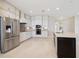 New kitchen with stainless steel appliances and recessed lighting at 15698 Marina Bay Dr, Winter Garden, FL 34787