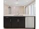 Kitchen island with stainless steel dishwasher and sink at 15698 Marina Bay Dr, Winter Garden, FL 34787