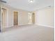 Spacious main bedroom with tray ceiling and access to the bathroom and walk-in closet for convenience at 15698 Marina Bay Dr, Winter Garden, FL 34787
