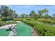 Community mini golf course with lush landscaping at 15698 Marina Bay Dr, Winter Garden, FL 34787