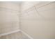 Bright walk-in closet featuring wire shelving, providing ample storage space at 15698 Marina Bay Dr, Winter Garden, FL 34787