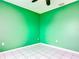 A green bedroom with a window at 1606 Bismarck Dr, Deltona, FL 32725