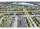 Aerial view of the neighborhood with ponds and lake nearby at 16217 Prairie School Dr, Winter Garden, FL 34787