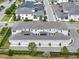 Aerial view of multi-Gathering units featuring multiple garages and mature landscaping at 16217 Prairie School Dr, Winter Garden, FL 34787