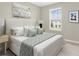 Well decorated bedroom with a large bed and decorative accents at 16217 Prairie School Dr, Winter Garden, FL 34787