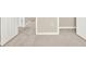 Bedroom showing neutral paint and carpet with multiple doors and ample space at 16217 Prairie School Dr, Winter Garden, FL 34787