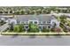 A street view shot of the townhome showing the roof and entry at 16217 Prairie School Dr, Winter Garden, FL 34787