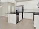 This kitchen features an island with a sink, stainless steel appliances, and plenty of cabinets at 16217 Prairie School Dr, Winter Garden, FL 34787