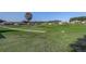 Beautiful backyard view overlooking a lush green golf course in a serene neighborhood at 1900 Nw 57Th Ct, Ocala, FL 34482