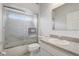 Cozy bathroom with shower, single sink vanity, and frosted glass shower door at 1900 Nw 57Th Ct, Ocala, FL 34482