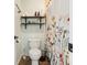 Bathroom with shelves, floral shower curtain, and tiled floors at 200 Maitland Ave # 52, Altamonte Springs, FL 32701