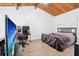 Lofted bedroom with a wood ceiling, a work space, and tile floors at 200 Maitland Ave # 52, Altamonte Springs, FL 32701