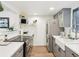 Updated kitchen featuring stainless steel appliances and light grey cabinets at 200 Maitland Ave # 52, Altamonte Springs, FL 32701