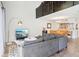 Cozy living room with second story view, modern furnishings, open layout to dining area, and natural light at 200 Maitland Ave # 52, Altamonte Springs, FL 32701