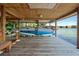 Covered boat dock features a boat lift and provides access to the lake at 2001 Bett Mar Ln, Winter Park, FL 32789