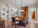 Dining area adjacent to kitchen with views through the archway at 2001 Bett Mar Ln, Winter Park, FL 32789