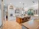 Bright kitchen with granite counters, a large island, and stainless appliances at 2001 Bett Mar Ln, Winter Park, FL 32789