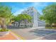 Beautiful condominium complex featuring well-maintained landscaping and sidewalks at 204 E South St # 2061, Orlando, FL 32801