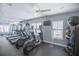 Well-equipped gym space offering treadmills, ellipticals, and free weights for resident fitness at 204 E South St # 2061, Orlando, FL 32801