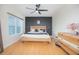 Stylish main bedroom with modern furnishings and a ceiling fan at 204 E South St # 2061, Orlando, FL 32801