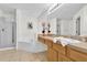 Spacious bathroom featuring a soaking tub, walk-in shower, and dual vanity at 213 Hideaway Beach Ln, Kissimmee, FL 34746
