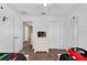 Inviting bedroom featuring twin beds, neutral walls, and minimalist decor at 213 Hideaway Beach Ln, Kissimmee, FL 34746
