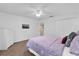 Relaxing bedroom featuring a dresser, closet, and soft lighting at 213 Hideaway Beach Ln, Kissimmee, FL 34746