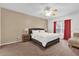 Inviting main bedroom featuring plush bedding, side tables, and bright natural light at 213 Hideaway Beach Ln, Kissimmee, FL 34746