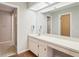 Bathroom with a sink, vanity, and a view into the toilet and shower area at 2309 Sun Valley Cir # 2309, Winter Park, FL 32792