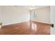 Bedroom with wood floors and a bright window at 2309 Sun Valley Cir # 2309, Winter Park, FL 32792