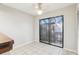 Bright dining area features tile flooring and sliding glass doors to a private courtyard at 2309 Sun Valley Cir # 2309, Winter Park, FL 32792