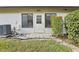 Charming front entrance with well-maintained lawn, plants, and clearly visible address number 2309 at 2309 Sun Valley Cir # 2309, Winter Park, FL 32792