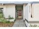 Inviting front entrance features a decorative wall and a well-maintained walkway at 2309 Sun Valley Cir # 2309, Winter Park, FL 32792