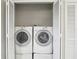 Laundry closet with full-size washer and dryer units at 2309 Sun Valley Cir # 2309, Winter Park, FL 32792