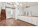 Spacious living area boasts soaring ceilings, a wet bar, a staircase, and abundant natural light at 2309 Sun Valley Cir # 2309, Winter Park, FL 32792