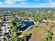 Aerial view of the neighborhood featuring lush greenery at 237 S Wilderness Pt, Casselberry, FL 32707