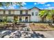 Inviting townhome with a well-maintained yard and charming curb appeal at 237 S Wilderness Pt, Casselberry, FL 32707