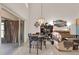Bright living space with dining area, sliding doors, and contemporary decor at 237 S Wilderness Pt, Casselberry, FL 32707