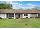 Backyard view showcasing the screened patio at 239 Hill St # 239, Casselberry, FL 32707