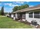 Backyard view showcasing the screened in patio at 239 Hill St # 239, Casselberry, FL 32707