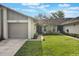 Charming single-story home featuring a well-manicured lawn and attached garage with a private residential street view at 239 Hill St # 239, Casselberry, FL 32707