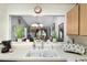 A closer view of the kitchen sink and pass-through to the living area beyond at 239 Hill St # 239, Casselberry, FL 32707