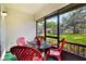 Outdoor patio with screened-in porch is perfect for relaxing or entertaining, offering community views at 239 Hill St # 239, Casselberry, FL 32707