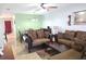 Cozy living room with elegant furnishings, comfortable seating, and plenty of natural light at 2812 Club Cortile Cir # A, Kissimmee, FL 34746