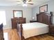 Spacious main bedroom with a bed, dresser, and bedside tables at 2812 Club Cortile Cir # A, Kissimmee, FL 34746