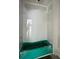 Unfinished bathroom with green tub and white walls at 2980 Embark Trail, St Cloud, FL 34771