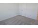 Bedroom featuring a double-door closet and plush carpeting at 2980 Embark Trail, St Cloud, FL 34771