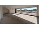 Spacious under-construction three-car garage with concrete floor at 2980 Embark Trail, St Cloud, FL 34771